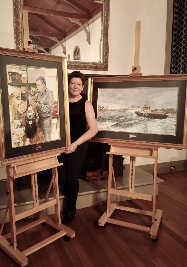 woman with two paintings on easels